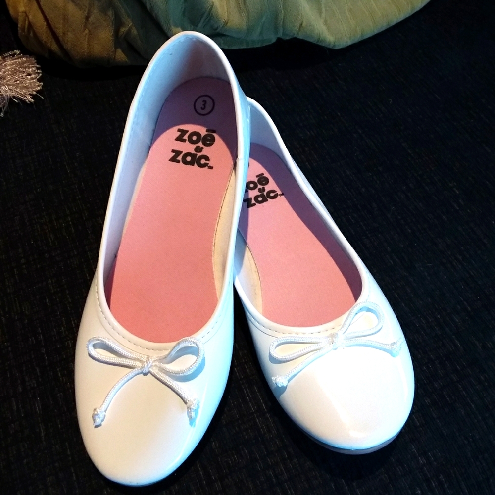 White ballet flats.